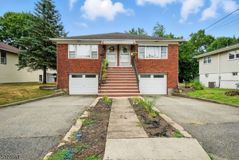 Attached, Exterior, Facade, Brick Facade, Raised Ranch