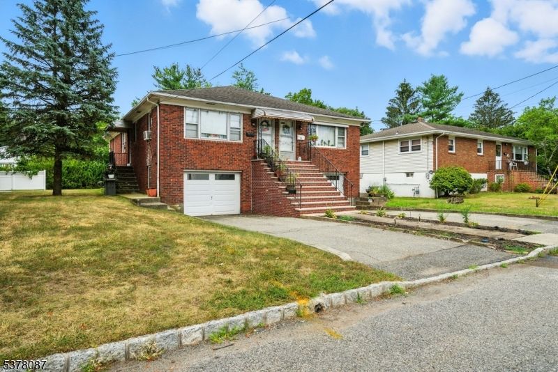 Attached, Exterior, Facade, Brick Facade, Raised Ranch