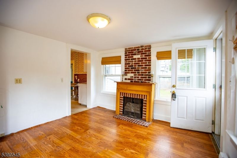 Empty room, Fireplace, Interior, Stone Walls, Wood Texture Flooring