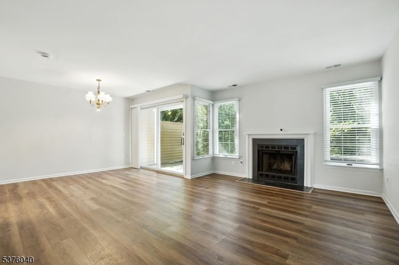 Chandelier, Empty room, Fireplace, Interior, Wood Texture Flooring