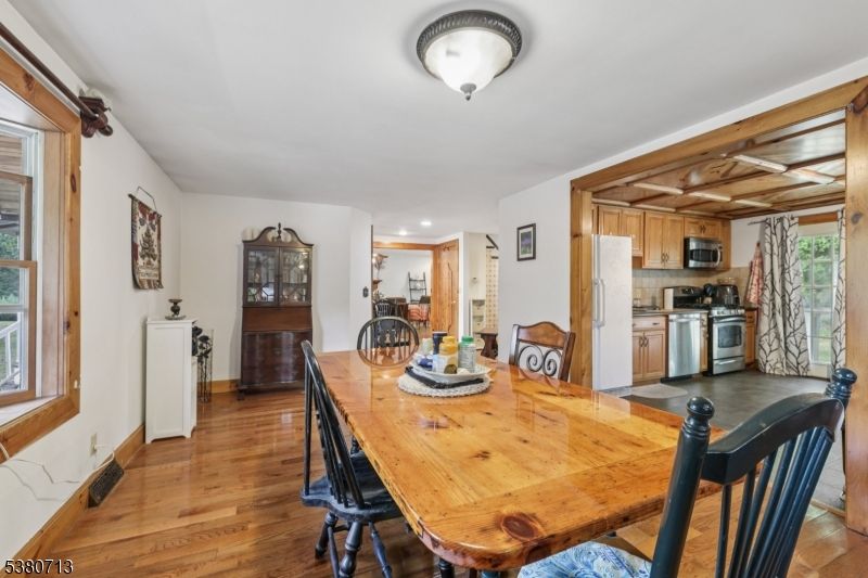 Dining room, Interior, Kitchen, Recessed Lighting, Stainless Steel Appliances, Wood Texture Flooring
