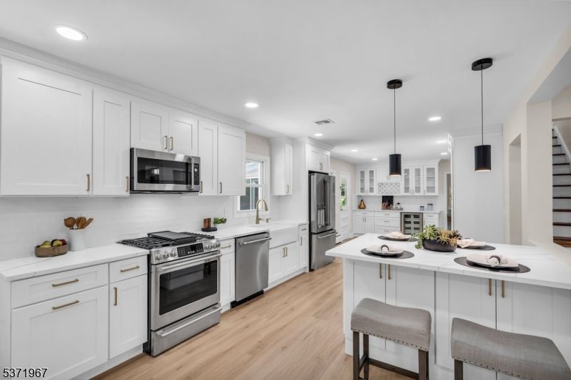 Interior, Kitchen, Pendant Lights, Recessed Lighting, Stainless Steel Appliances, Wood Texture Flooring