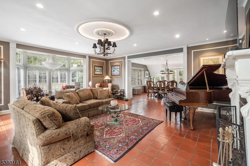 Chandelier, Dining room, Fireplace, Interior, Living room, Piano, Recessed Lighting