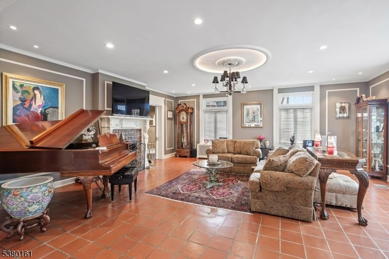 Chandelier, Fireplace, Interior, Living room, Piano, Recessed Lighting
