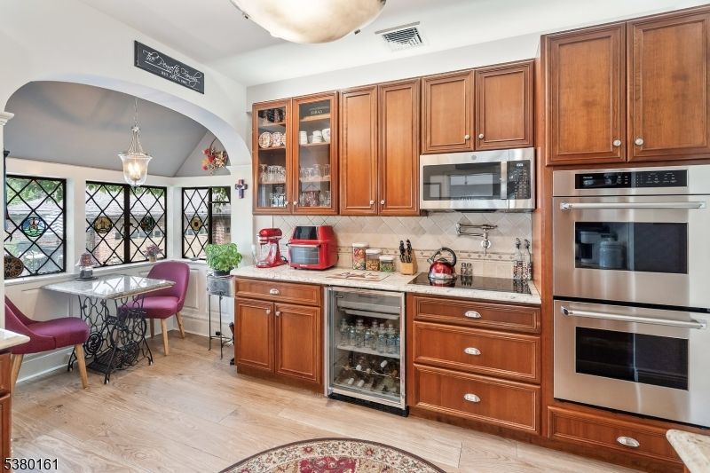 Dining room, Interior, Kitchen, Pendant Lights, Stainless Steel Appliances, Wood Texture Flooring