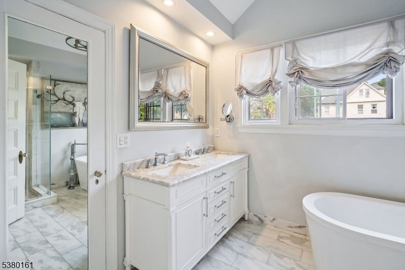 Bathroom, Dual Sink Vanities, Free Standing Baths, Glass Shower, Interior, Marble, Recessed Lighting