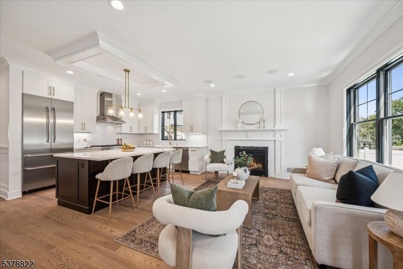 Fireplace, Interior, Kitchen, Living room, Pendant Lights, Recessed Lighting, Stainless Steel Appliances, Wood Texture Flooring