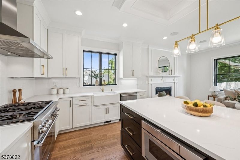 Fireplace, Interior, Kitchen, Pendant Lights, Recessed Lighting, Stainless Steel Appliances, Wood Texture Flooring