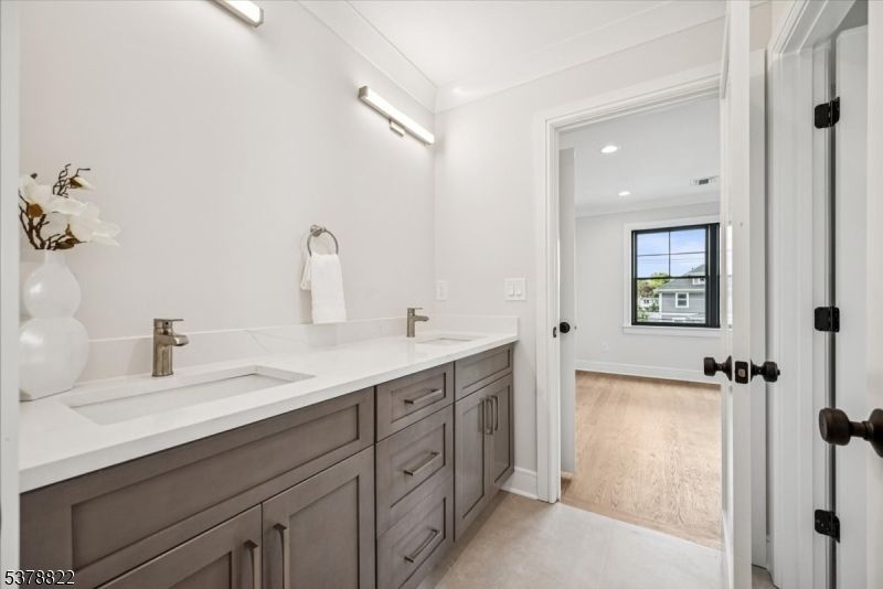 Bathroom, Dual Sink Vanities, Interior, Recessed Lighting, Wood Texture Flooring