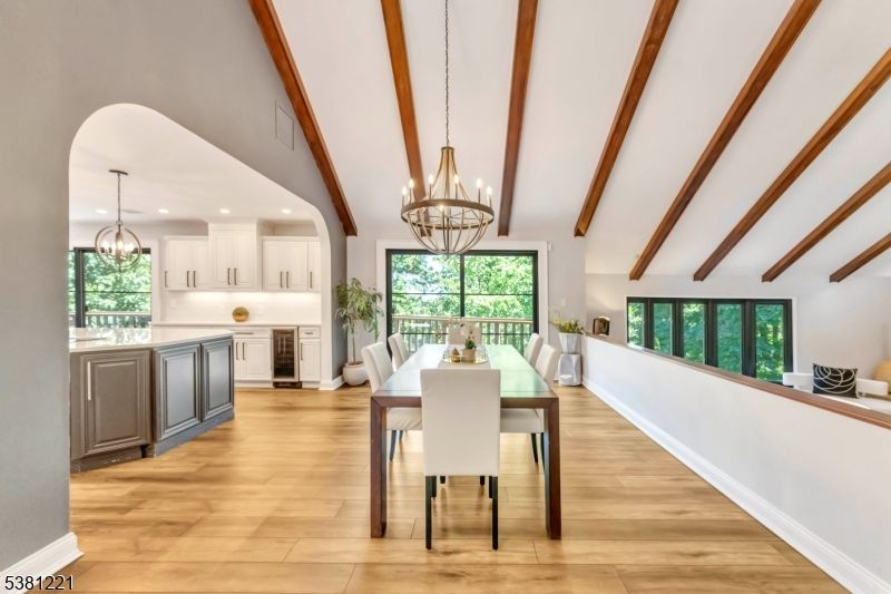 Chandelier, Dining room, Interior, Kitchen, Pendant Lights, Recessed Lighting, Wooden Beams, Wood Texture Flooring