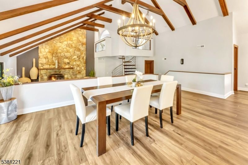 Chandelier, Dining room, Fireplace, Interior, Stone Walls, Wooden Beams, Wood Texture Flooring