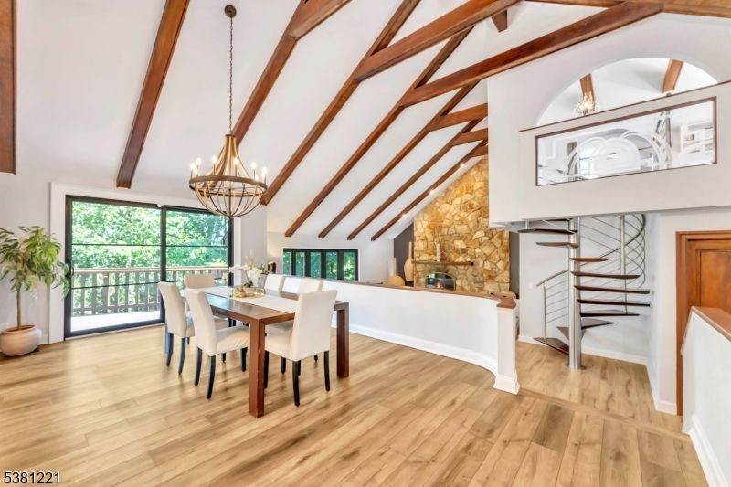 Chandelier, Dining room, Fireplace, Interior, Stone Walls, Wooden Beams, Wood Texture Flooring