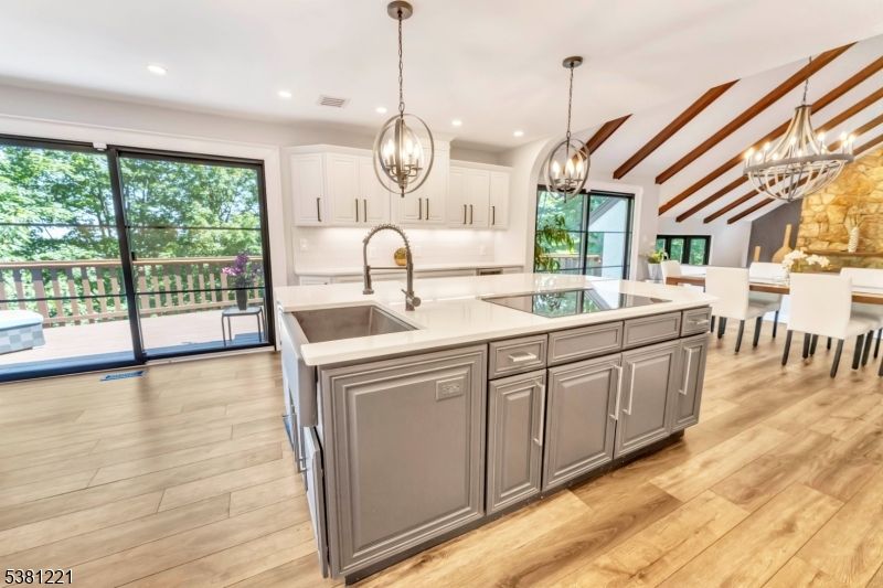 Chandelier, Dining room, Interior, Kitchen, Pendant Lights, Recessed Lighting, Wooden Beams, Wood Texture Flooring