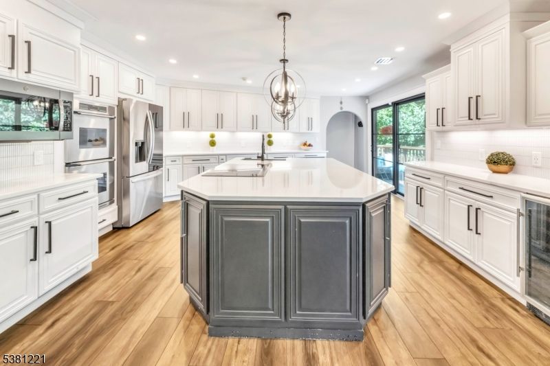 Chandelier, Interior, Kitchen, Pendant Lights, Recessed Lighting, Stainless Steel Appliances, Wood Texture Flooring