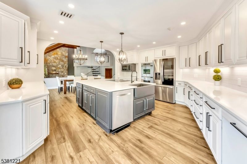 Chandelier, Dining room, Interior, Kitchen, Pendant Lights, Recessed Lighting, Stainless Steel Appliances, Wooden Beams, Wood Texture Flooring