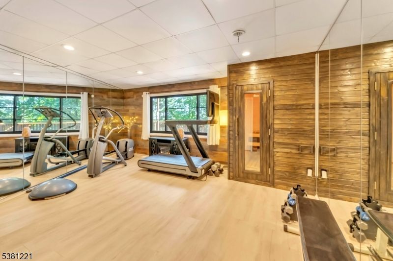 Fitness Equipment, Gym, Interior, Recessed Lighting, Wood Texture Flooring, Wooden Walls