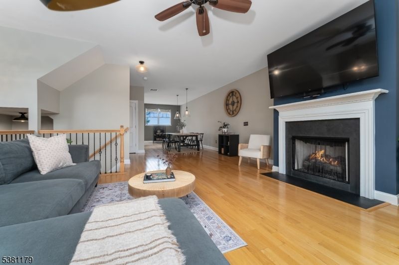Dining room, Fireplace, Interior, Living room, Pendant Lights, Wood Texture Flooring