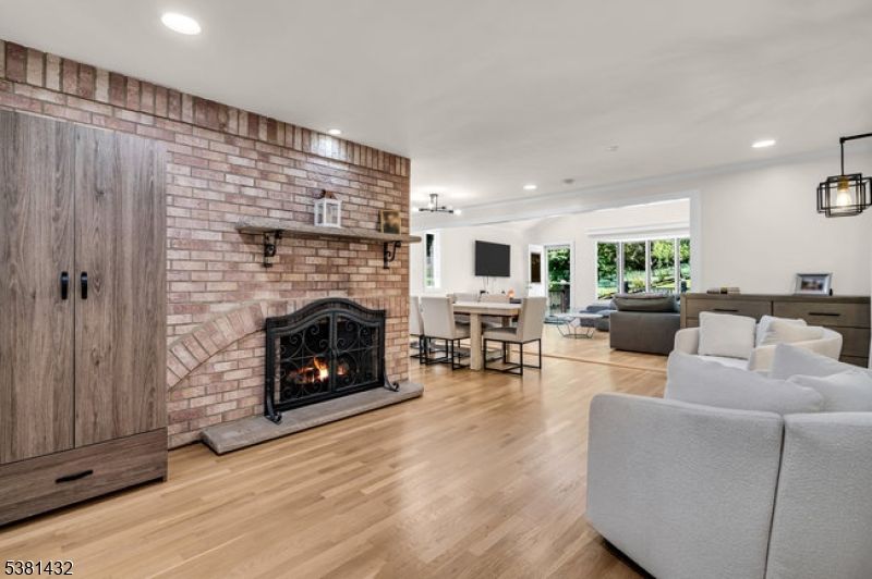 Dining room, Fireplace, Interior, Living room, Pendant Lights, Recessed Lighting, Stone Walls, Wood Texture Flooring