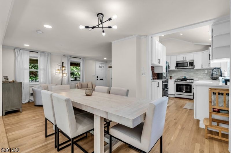 Dining room, Interior, Kitchen, Pendant Lights, Recessed Lighting, Stainless Steel Appliances, Wood Texture Flooring