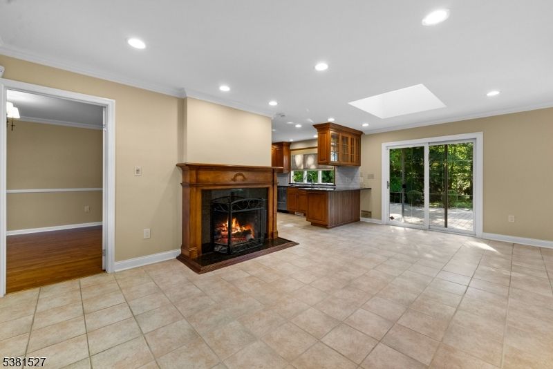 Empty room, Fireplace, Interior, Kitchen, Recessed Lighting, Wood Texture Flooring
