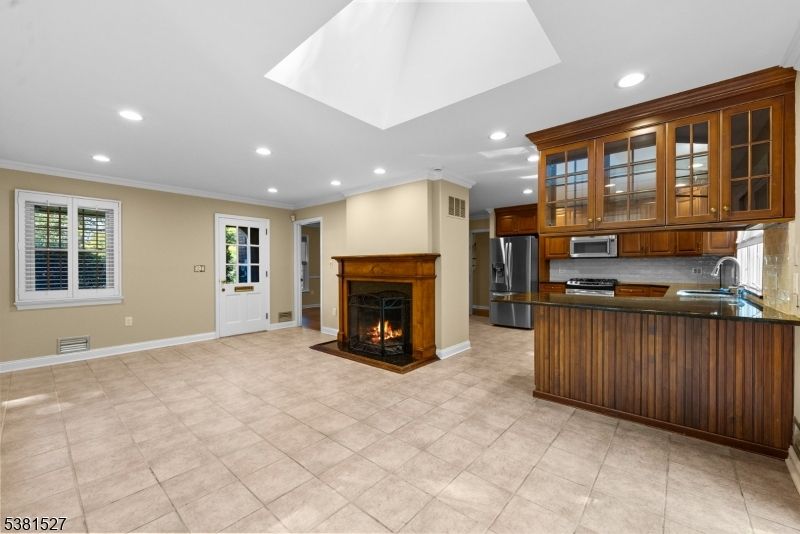 Fireplace, Interior, Kitchen, Recessed Lighting, Stainless Steel Appliances