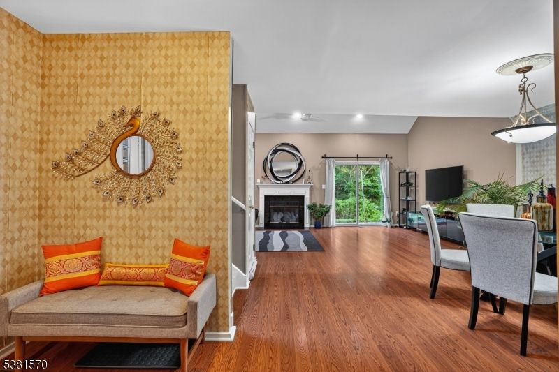 Dining room, Fireplace, Interior, Pendant Lights, Recessed Lighting, Wood Texture Flooring