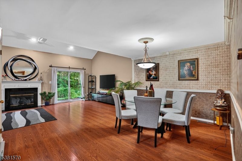 Dining room, Fireplace, Interior, Pendant Lights, Recessed Lighting, Wood Texture Flooring