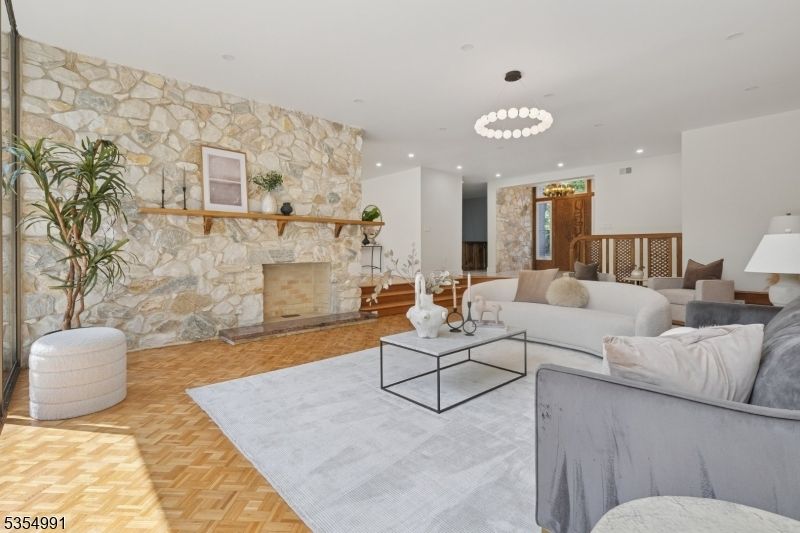 Fireplace, Interior, Living room, Pendant Lights, Recessed Lighting, Stone Walls, Wood Texture Flooring