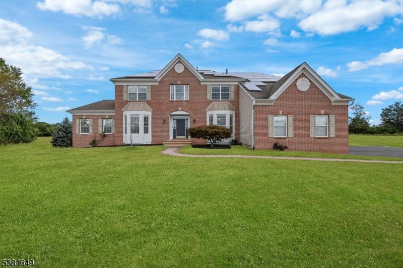 Backyard, Exterior, Facade, Brick Facade, Solar Panels, Brick Traditional