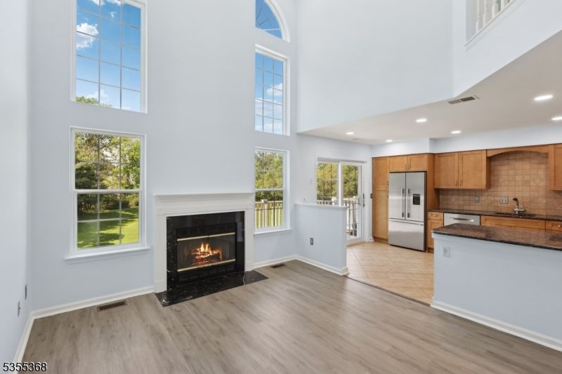 Fireplace, Interior, Kitchen, Recessed Lighting, Wood Texture Flooring