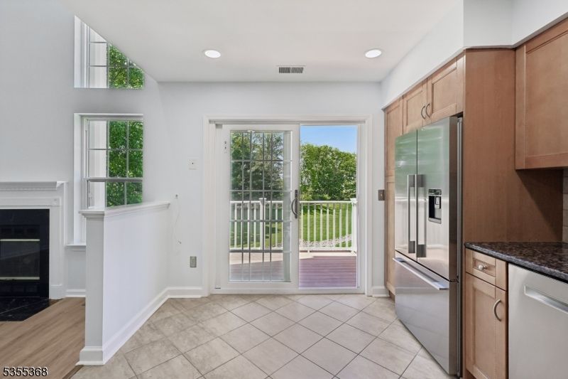 Fireplace, Interior, Kitchen, Recessed Lighting, Stainless Steel Appliances