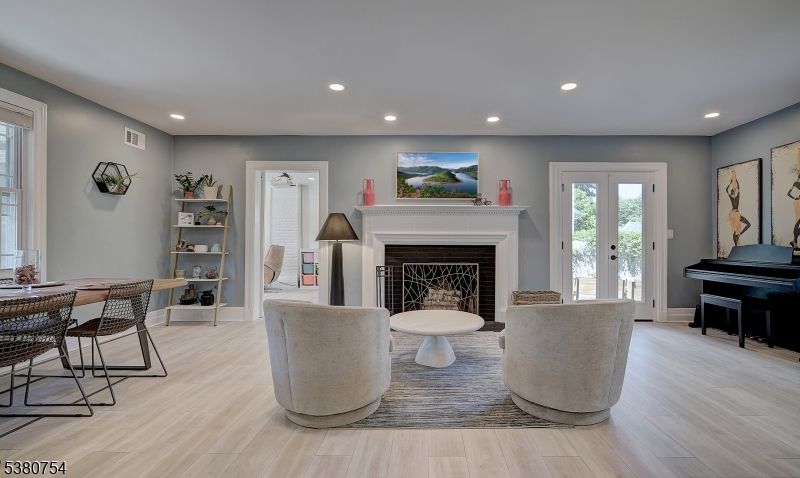 Fireplace, Interior, Living room, Piano, Recessed Lighting, Wood Texture Flooring