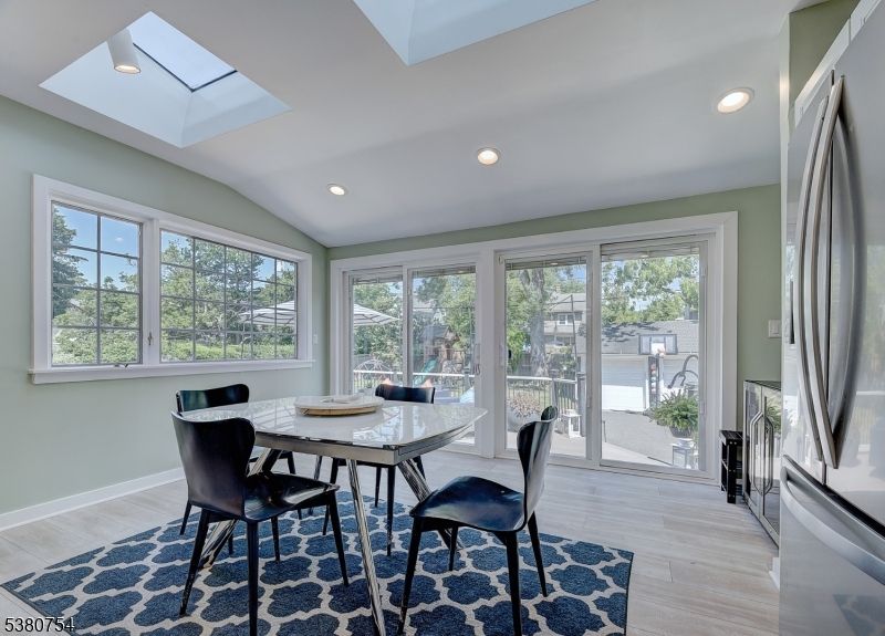 Dining room, Interior, Recessed Lighting, Sun Room, Wood Texture Flooring