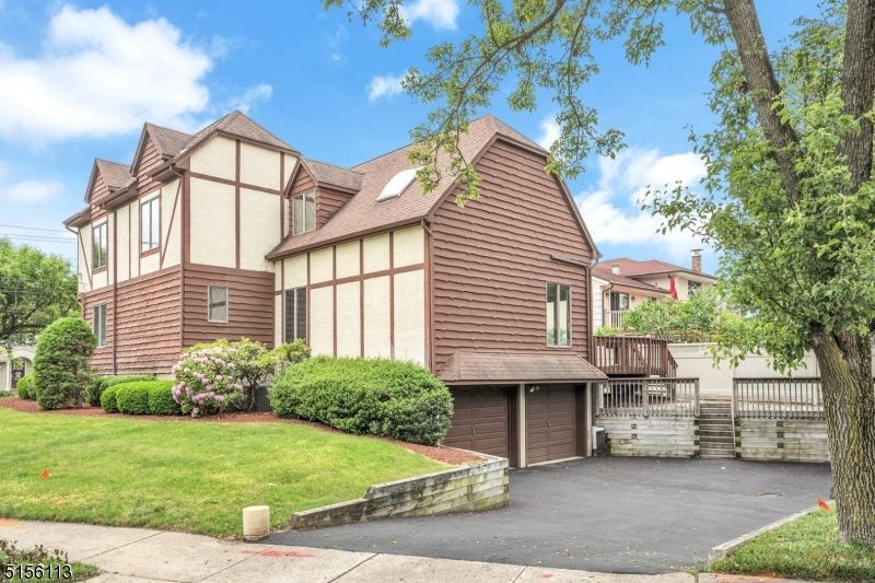 Attached, Exterior, Facade, Tudor Revival