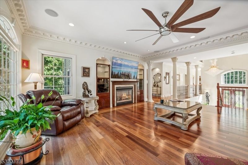Chandelier, Fireplace, Interior, Living room, Recessed Lighting, Wood Texture Flooring