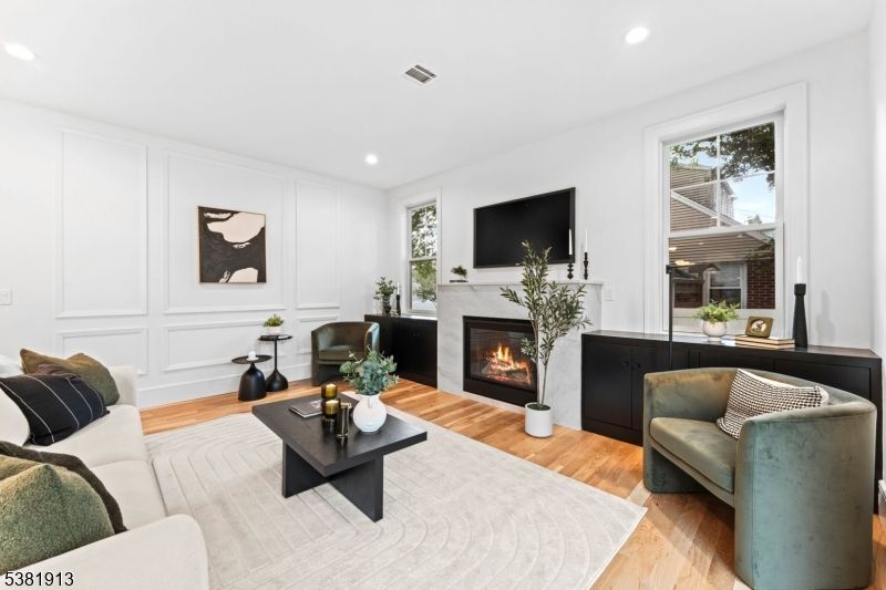 Fireplace, Interior, Living room, Recessed Lighting, Wood Texture Flooring