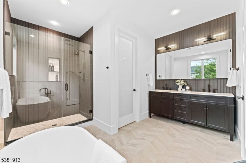 Bathroom, Dual Sink Vanities, Free Standing Baths, Glass Shower, Interior, Recessed Lighting, Wood Texture Flooring