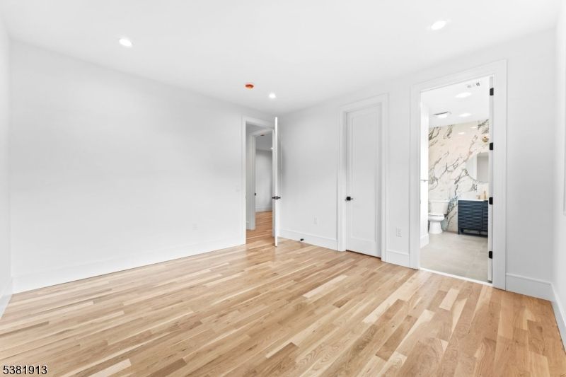Empty room, Interior, Marble Walls, Recessed Lighting, Wood Texture Flooring