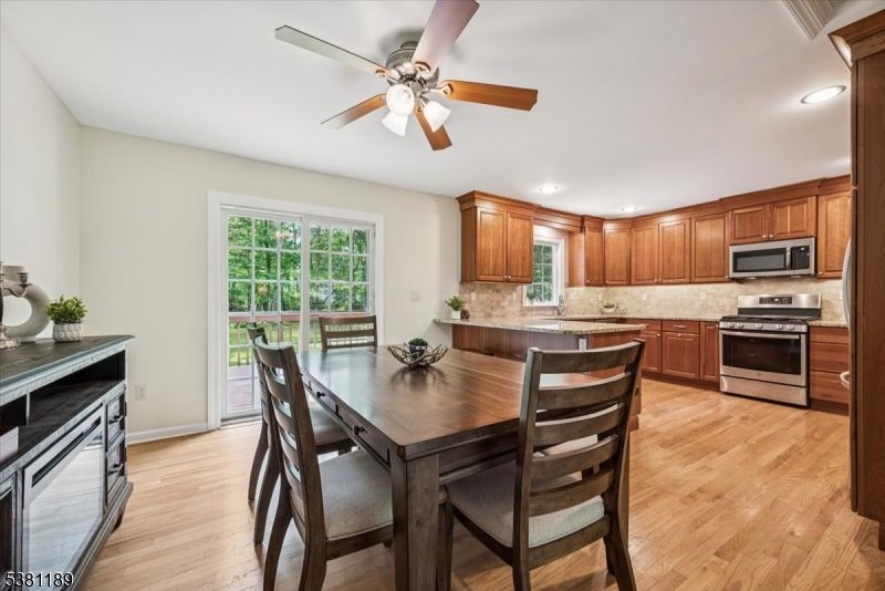 Dining room, Interior, Kitchen, Recessed Lighting, Stainless Steel Appliances, Wood Texture Flooring