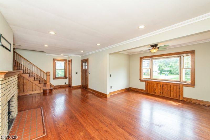 Empty room, Fireplace, Interior, Recessed Lighting, Wood Texture Flooring