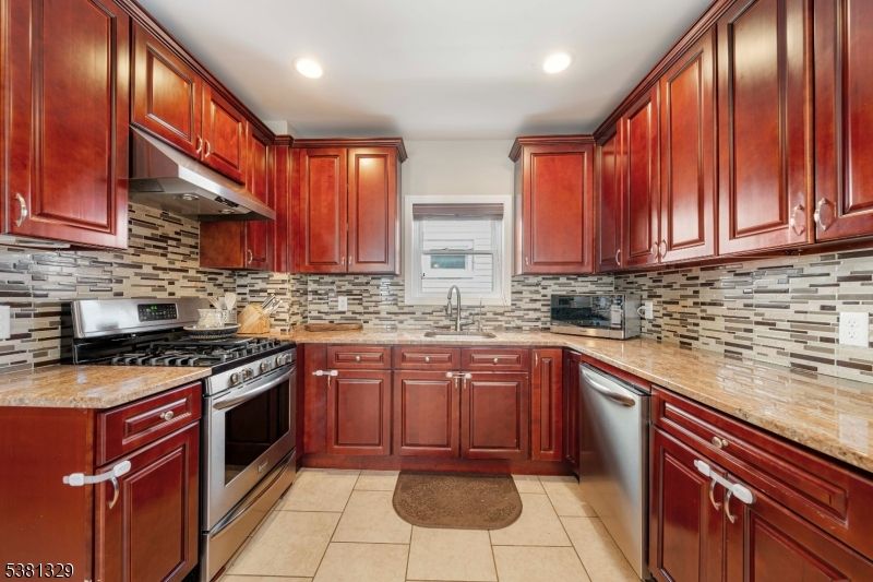 Interior, Kitchen, Recessed Lighting, Stainless Steel Appliances, Stone Walls