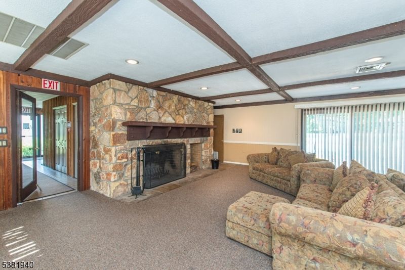 Fireplace, Interior, Living room, Recessed Lighting, Stone Walls, Wooden Beams