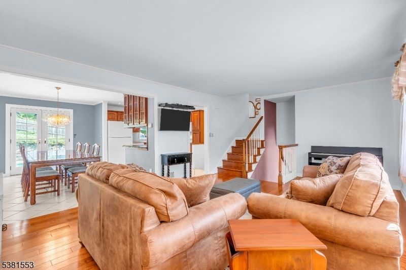 Chandelier, Dining room, Fireplace, Interior, Living room, Wood Texture Flooring