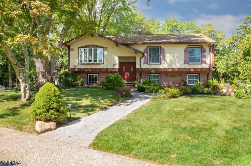 Exterior, Facade, Brick Facade, Raised Ranch