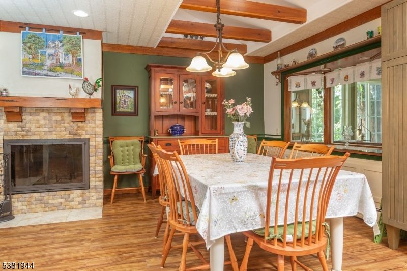Dining room, Fireplace, Interior, Pendant Lights, Recessed Lighting, Wooden Beams, Wood Texture Flooring