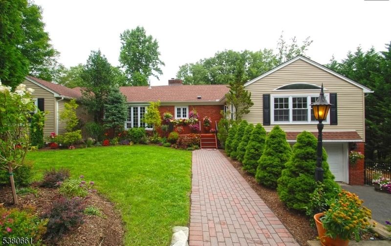Attached, Backyard, Exterior, Facade, Brick Facade, Split Level