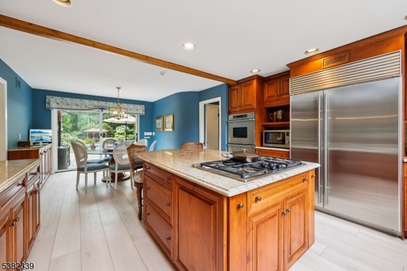 Chandelier, Dining room, Interior, Kitchen, Recessed Lighting, Stainless Steel Appliances, Wood Texture Flooring
