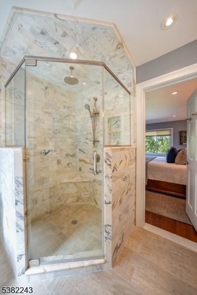 Bathroom, Glass Shower, Interior, Marble Walls, Recessed Lighting, Wood Texture Flooring