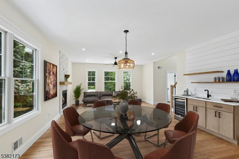 Dining room, Fireplace, Interior, Kitchen, Living room, Pendant Lights, Recessed Lighting, Wood Texture Flooring