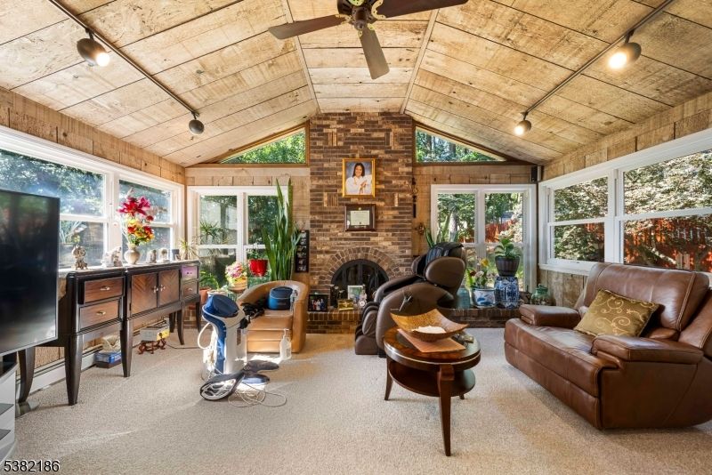 Fireplace, Interior, Living room, Stone Walls, Sun Room, Wooden Ceilings, Wooden Walls